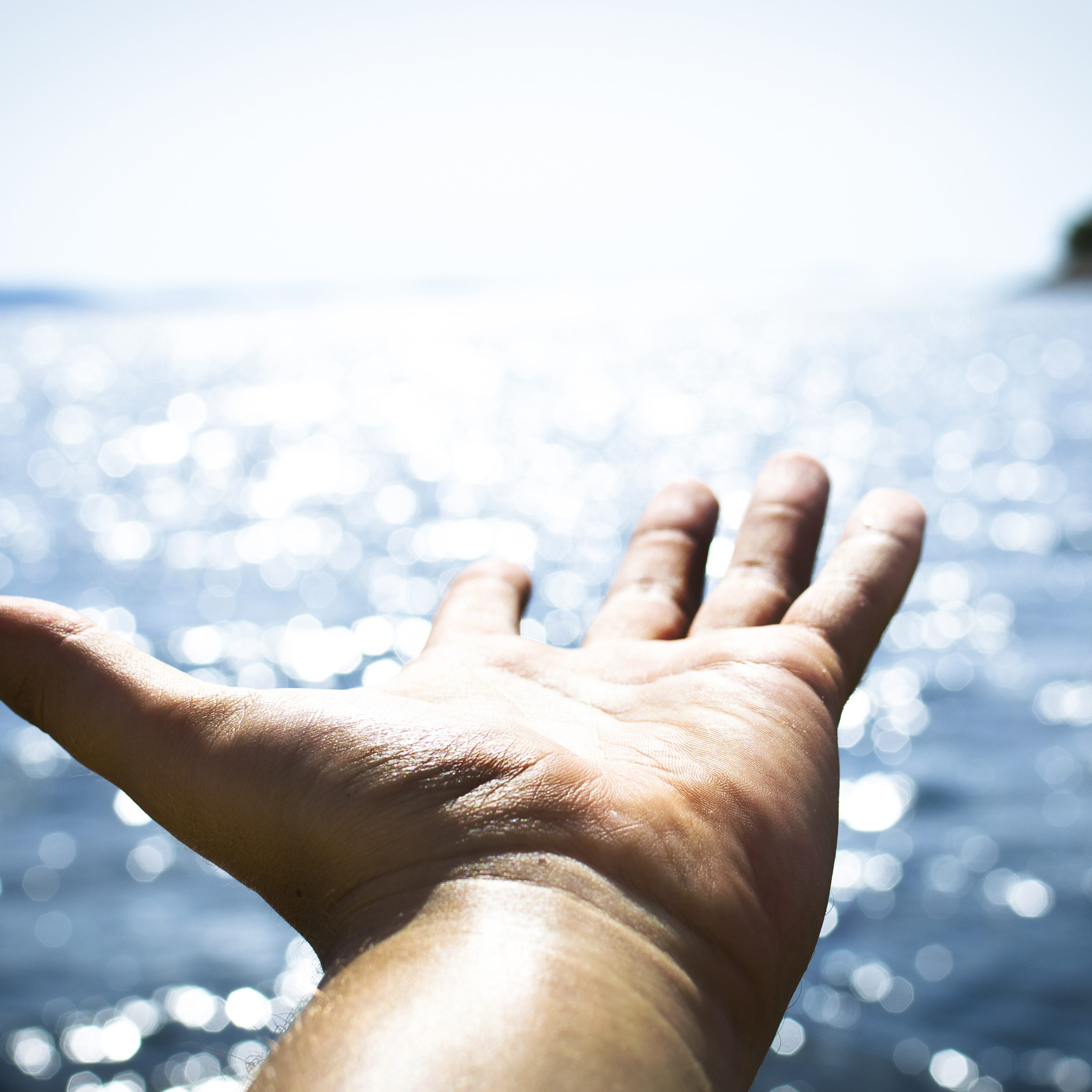 Man feeling freedom on open sea